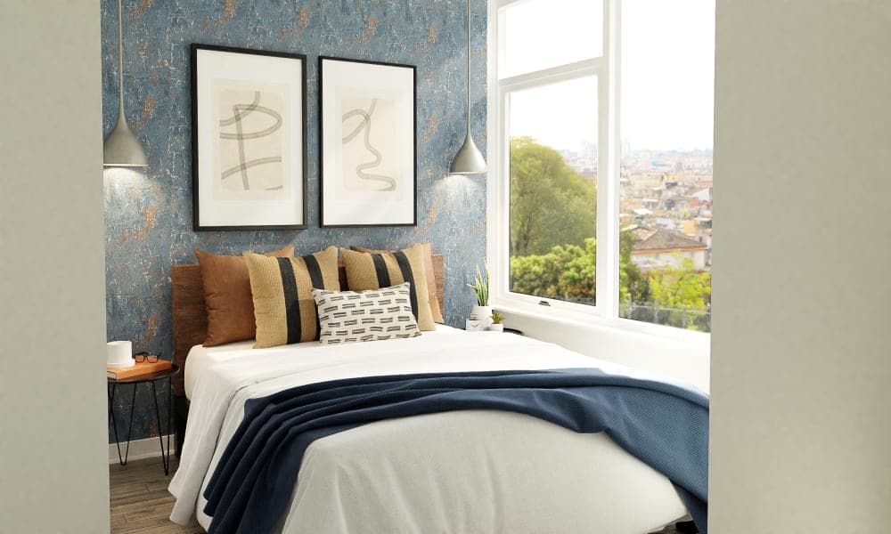 A Modern Industrial Bedroom With Navy Accents